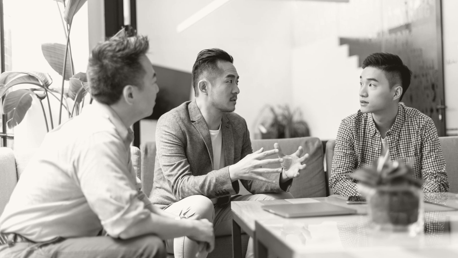 Three business leaders in earnest, grounded conversation — the kind of real-room dialogue BEA is built for